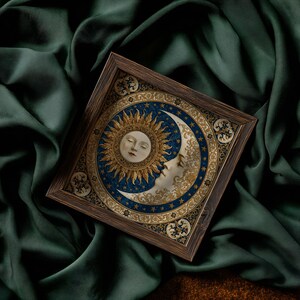 May include: A square wooden tray featuring a central circular illustration of a sun and a crescent moon with human faces. The design incorporates gold, blue, and cream colors with intricate filigree patterns and small stars on a dark blue background.