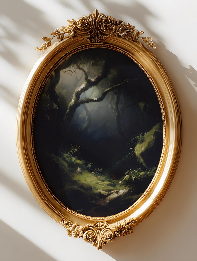 May include: An oval-shaped, gold-colored framed painting depicting a dark forest scene. The artwork features a detailed landscape with trees, foliage, and a path, all within an ornate, decorative frame.