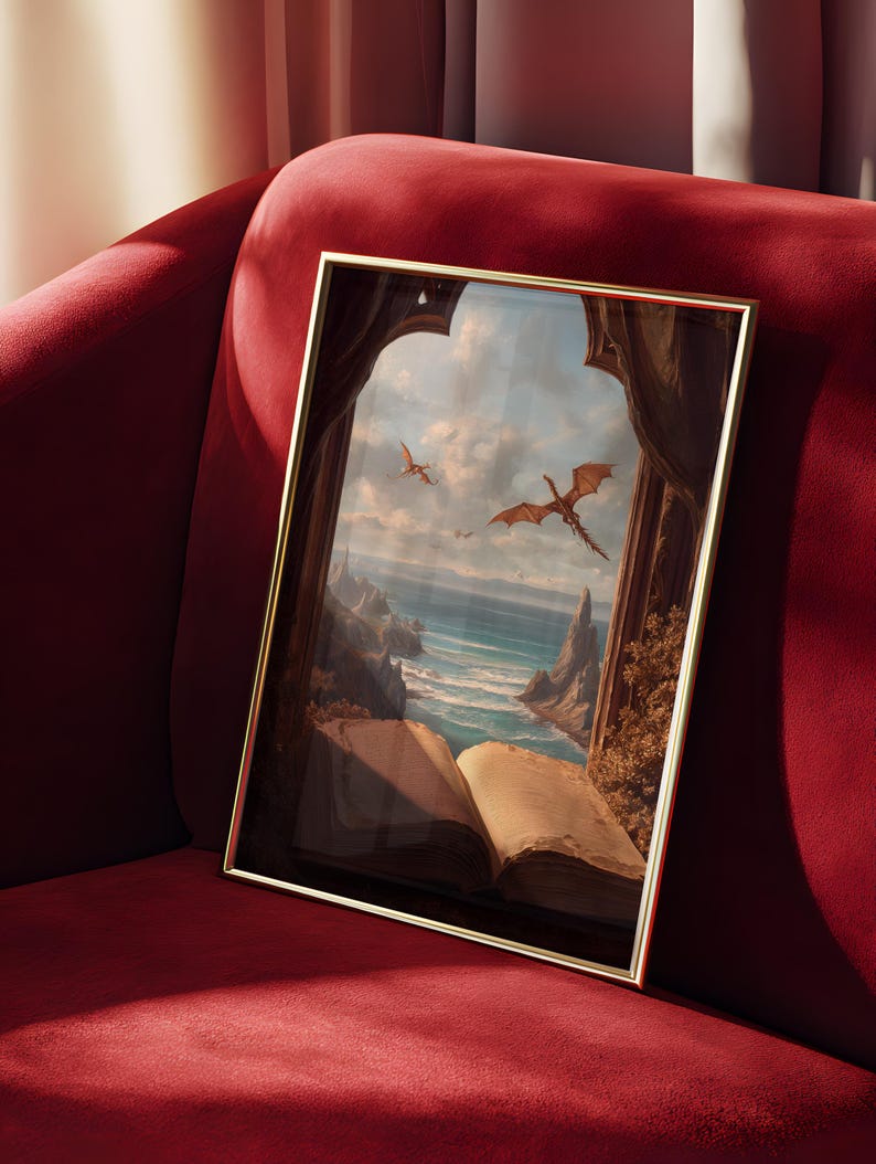 May include: A framed art print featuring a fantasy landscape with dragons soaring over a coastal scene. The artwork is set within a golden frame and depicts an open book in the foreground, with a red velvet sofa in the background.
