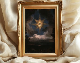 May include: A rectangular gold-toned ornate frame containing a print of a dark, cloudy night sky. A large, radiant golden star with eight points is centered in the sky, featuring a realistic human eye at its core, surrounded by dark clouds.