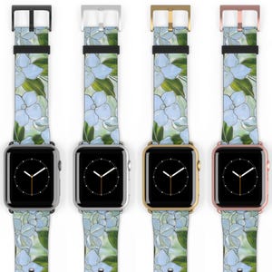 May include: Four stainless steel smart watch bands with floral patterns in blue and green. The watch bands have black, silver, gold, and rose gold hardware. The text "FOUR STAINLESS STEEL COLOR OPTIONS AVAILABLE" is printed vertically on the left.