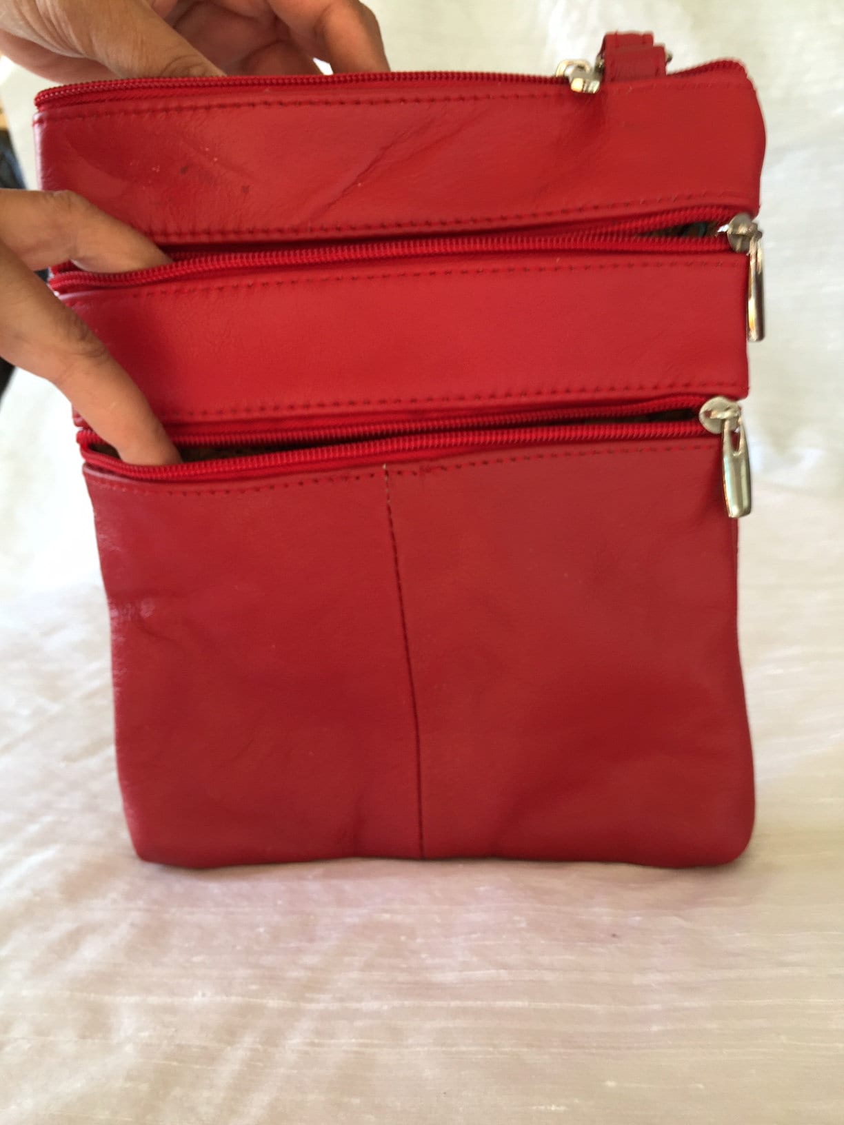 red travel crossbody bag