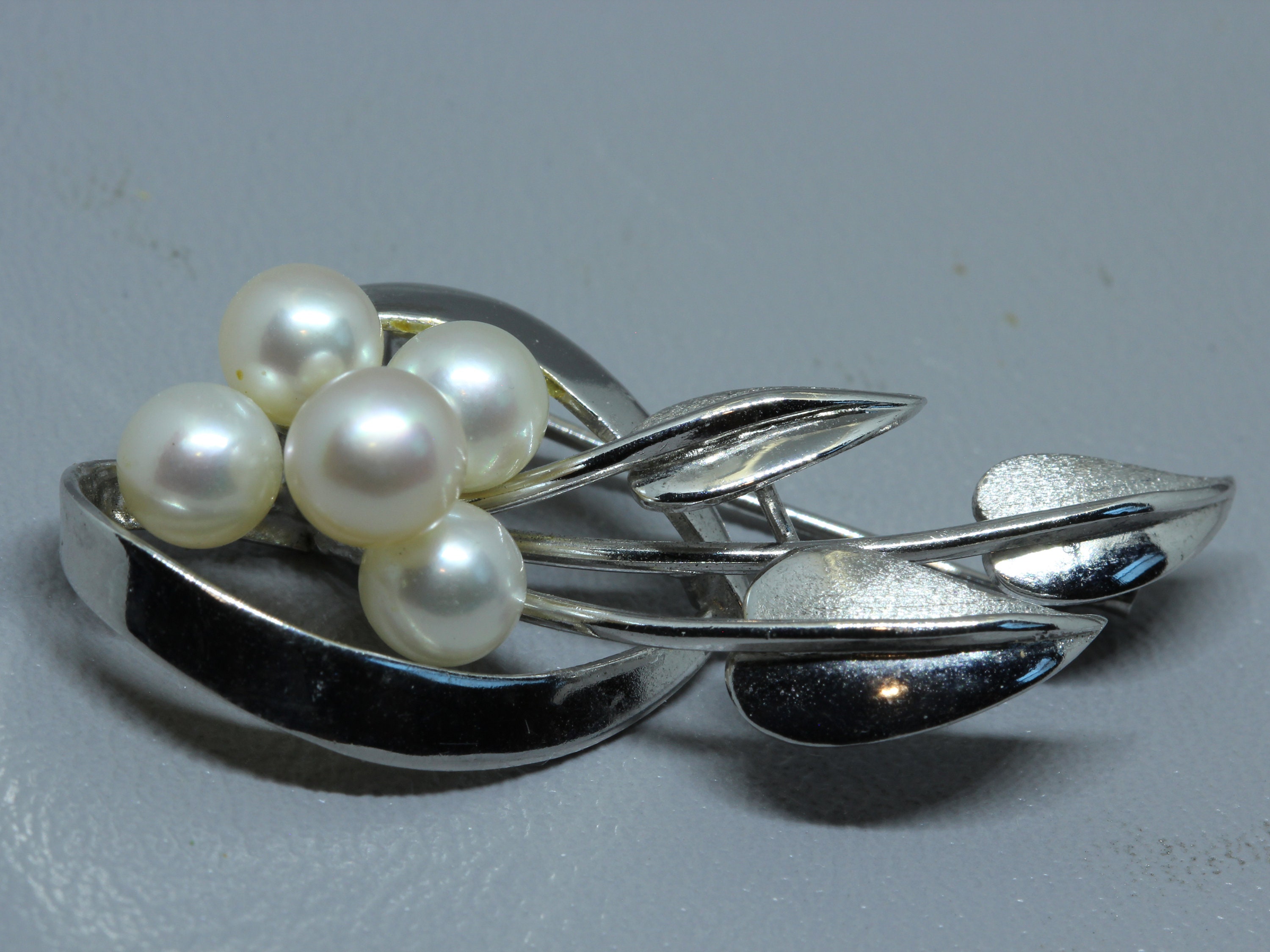 Tasaki Designed Akoya Pearl Brooch. Set in Fine Silver Bow Design