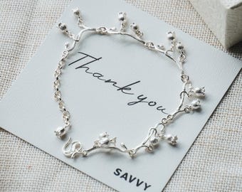 Armband van 99% puur zilver met lelietjes-van-de-dalenmotief: antieke filigraan sieraden met natuurlijke takken.