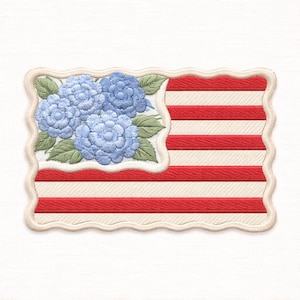 May include: Embroidered patch featuring a stylized American flag design. The flag incorporates blue hydrangea flowers and green leaves in the upper left corner, with red and white stripes. The patch has a scalloped edge.