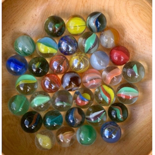 Lot of 35 Glass Marbles - 1 glows