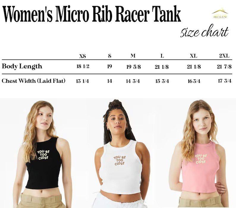 May include: Three women modeling micro rib racer tanks in black, white, and pink. The tanks have a racerback design and the text "YOU'RE TOO CLOSE" printed on the front. A size chart is displayed above the models.