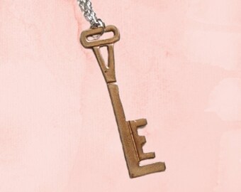 stylized LOVE necklace in the shape of a key, true vintage copper on silver cable chain