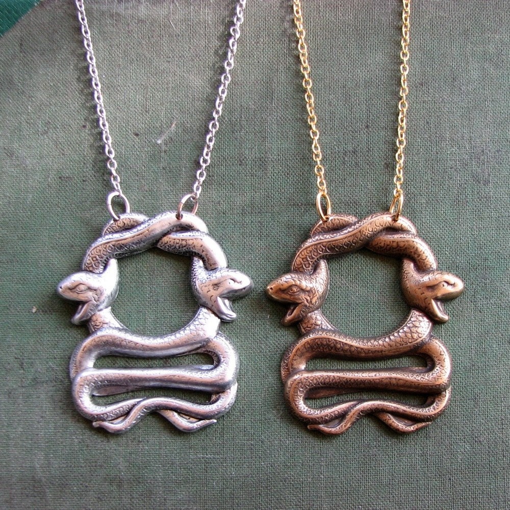 coiled snakes necklace . choose silver or gold Etsy