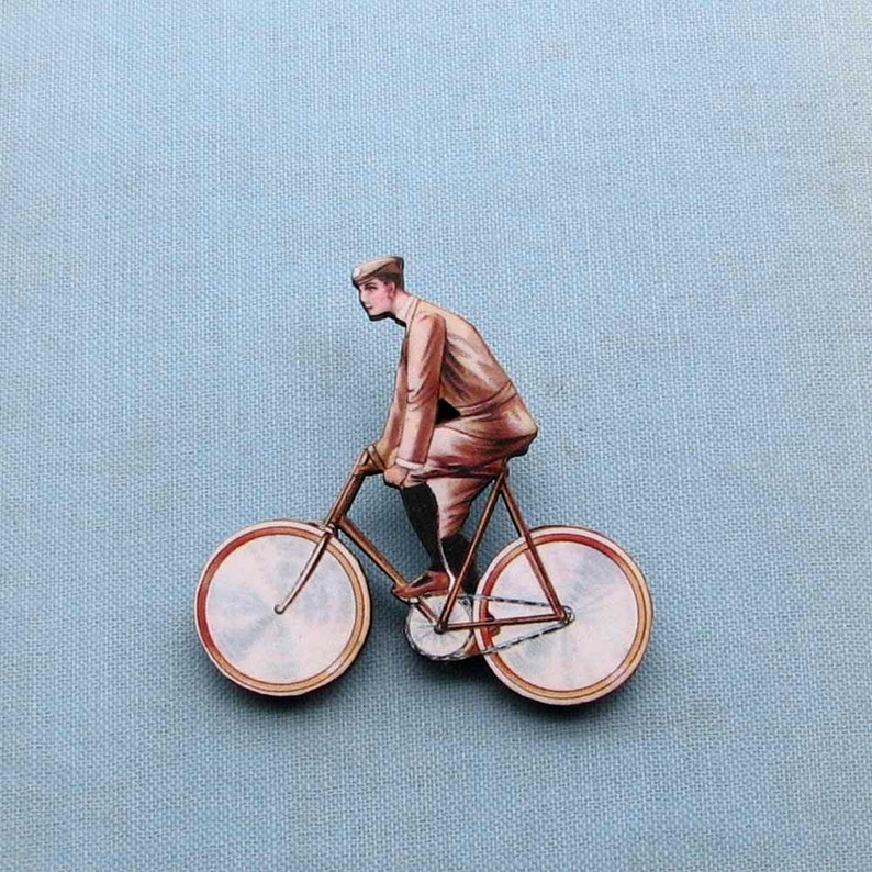 antique french style guy on a bicycle tie tack brooch pin cyclist jewelry