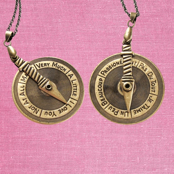 love meter spinner necklace in English and French, double sided on long chain