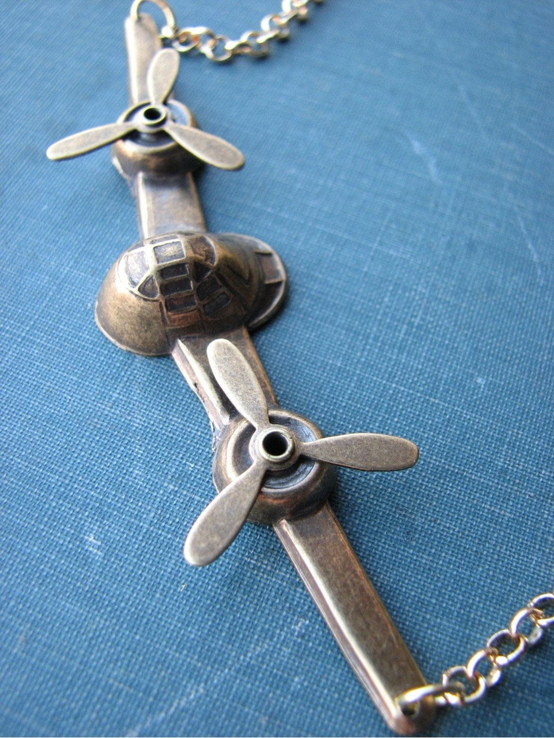 Golden airplane necklace with moving propellers statement Etsy