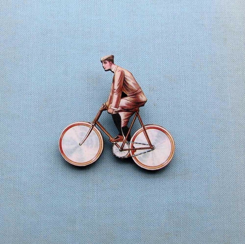 antique french style guy on a bicycle tie tack brooch pin cyclist jewelry