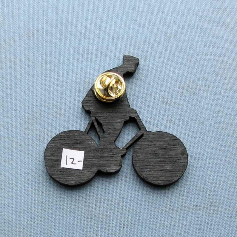 antique french style guy on a bicycle tie tack brooch pin cyclist jewelry