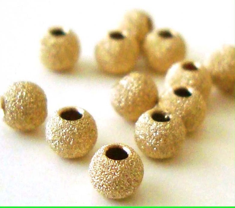 2mm 3mm 4mm 5mm 6mm 7mm 8mm 10mm 12mm 14k yellow gold filled stardust star dust seamless round bead spacer gs20 image 1