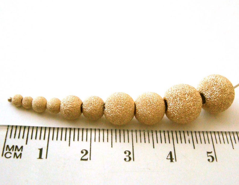 2mm 3mm 4mm 5mm 6mm 7mm 8mm 10mm 12mm 14k yellow gold filled stardust star dust seamless round bead spacer gs20 image 8