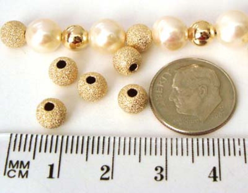 2mm 3mm 4mm 5mm 6mm 7mm 8mm 10mm 12mm 14k yellow gold filled stardust star dust seamless round bead spacer gs20 image 6