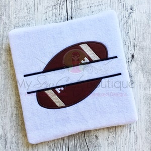 May include: A white fabric with a brown and white football design split in half with a black line. The text "My Sew C Boutique" is on the line.