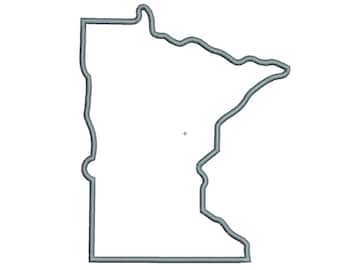 May include: A machine embroidery design featuring the outline of the state of Minnesota. The shape is defined by a single, continuous satin stitch border in a muted blue-grey thread colour, creating a clean and simple geographic silhouette.