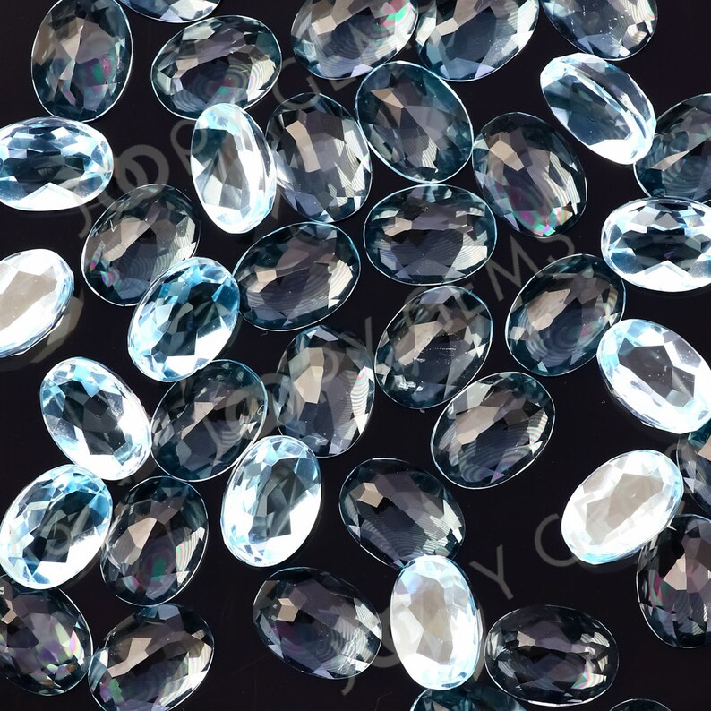 Sky Blue Topaz Rose Cut Oval Cabochon 8x6mm per stone