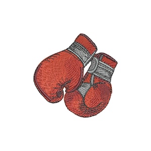 Puede incluir: Imagen bordada de dos guantes de boxeo rojos con costuras negras y muñequeras grises. Los guantes están en ángulo, sugiriendo acción. El diseño es detallado y texturado, ideal para proyectos deportivos.