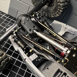 2 Pack MEUS Isokinetic axle skid plates. Hardware included!!   SCX24
