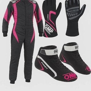May include: A black and pink OMP racing suit, a pair of black and pink OMP Firena gloves with textured palms, and a pair of black and pink OMP First racing shoes with white ankle straps and white side stripes, all displayed against a plain background.