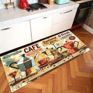 May include: Rectangular coffee-themed floor mat with a vintage design. The mat features images of coffee pots, cups, and coffee beans, with text that reads "CAFE Fünaid" and "Brewed & Fresh with Love". The color palette includes beige, brown, and red.