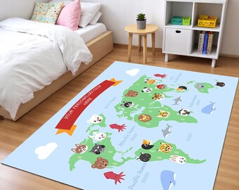 May include: A light blue rectangular rug featuring a world map design with green continents and various animal illustrations. The rug includes the text "YOUR PERSONALIZATION HERE" on a red banner. The design includes oceans and clouds.