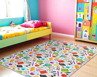 May include: A rectangular area rug with a white background and a colorful pattern of school supplies. The design includes scissors, rulers, globes, calculators, and paint palettes. The rug is placed in a child's bedroom.