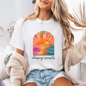 Chasing Sunsets Surf Tee, Summer Vibes Beach Shirt, Unisex Softstyle Top, Surfer Vacation Tee, Salty Mermaidcore T-Shirt