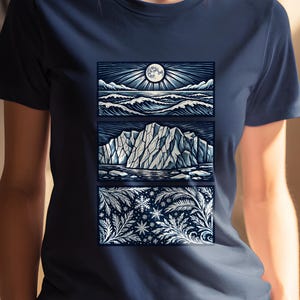 Elemental shirt — three-panel woodcut triptych with arctic waves, iceberg and frost crystals in ice blue and white on navy, nature elements shirt for ocean lovers