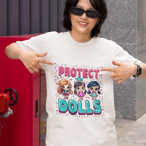 Protect the Dolls feminist shirt, retro 8-bit arcade game style women's rights tee for gaming culture gift