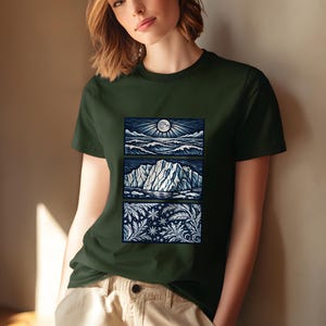Elemental shirt — three-panel woodcut triptych with arctic waves, iceberg and frost crystals in ice blue and white on navy, nature elements shirt for ocean lovers