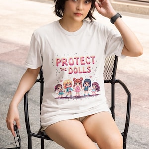 Protect the Dolls feminist shirt, retro 8-bit arcade game style women's rights tee for gaming culture gift
