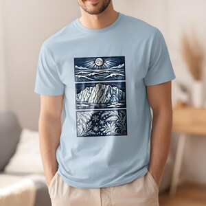 Elemental shirt — three-panel woodcut triptych with arctic waves, iceberg and frost crystals in ice blue and white on navy, nature elements shirt for ocean lovers