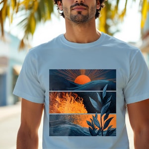 Op de afbeelding: Lichtblauw T-shirt met een ontwerp in drie panelen. Het bovenste paneel toont een zonsondergang boven donkerblauwe golven. Het middelste paneel toont oranje vlammen. Het onderste paneel toont blauwe golven en oranje accenten.
