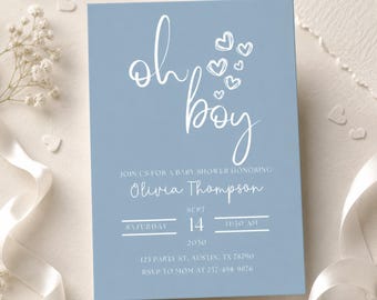 Könnte beinhalten: Eine rechteckige Babyparty-Einladungskarte in Staubblau mit weißem Text, der oh boy, join us for a baby shower honoring Olivia Thompson, Saturday Sept 14 2030, 11:30 AM, 123 Party St, Austin, TX 78790, RSVP 737-498-9876 lautet.