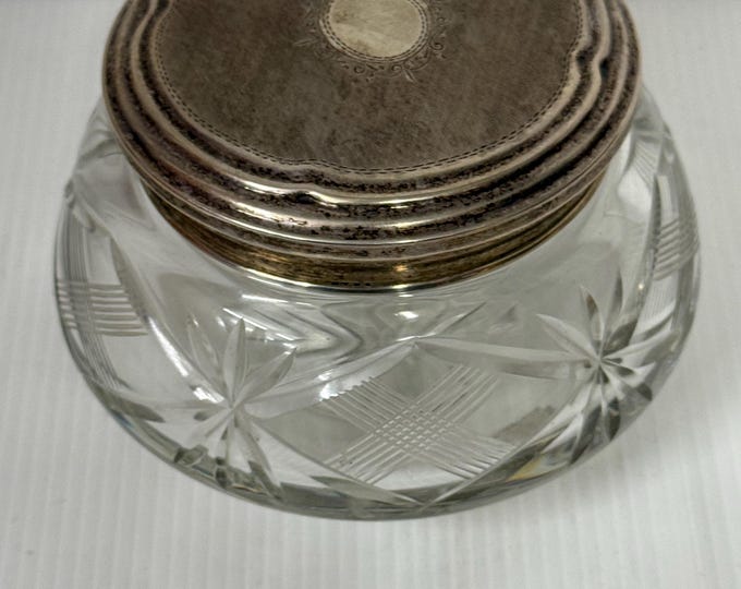 Crystal toiletry container with silver lid