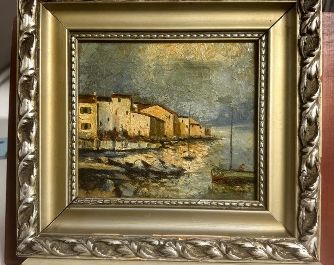 Antique oil painting on canvas of a coastal landscape