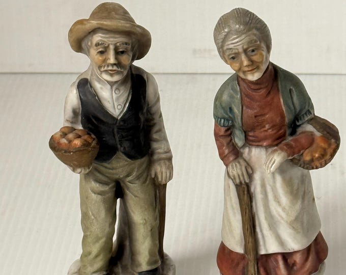 Coppia di statue in ceramica