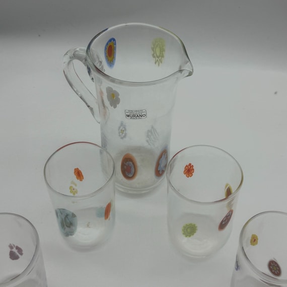 Murano glass carafe and 4 hand-blown and hand-opened glasses with murrine inserts.