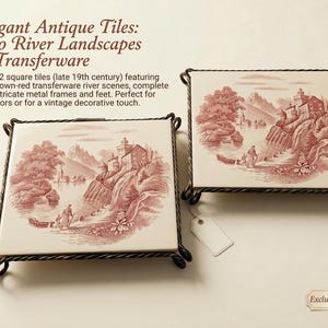 May include: Two antique square tiles with brown-red river landscape scenes. Each tile has an intricate metal frame and feet. The text on the image says "Elegant Antique Tiles: Two River Landscapes in Transferware."