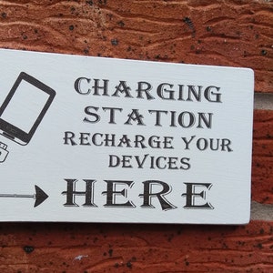 Charging station mobile phone home office work pub recharge phone sign