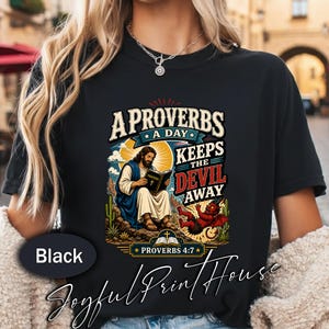 Proverbs A Day Keeps The Devil Away Shirt, Christian Bible Verse Shirt, Jesus Reading Proverbs Tee, Faith Graphic Shirt, Proverbs 4:7 Gift