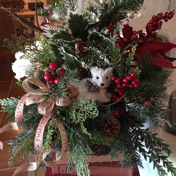 Centerpiece  for a holiday table. This  design, features  a Christmas  settng; including this cute Westie puppy  and White Hydrangea