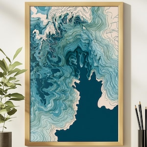 May include: A rectangular wall art piece in a light wood frame featuring a layered topographic map design. The artwork displays abstract, flowing contour lines in shades of deep teal, turquoise, and white, creating a sense of depth and movement.