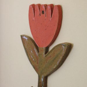 Gancho de pared de cerámica hecho a mano