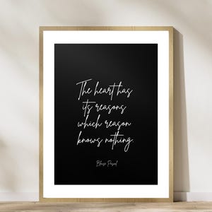 May include: Black and white printable wall art featuring a quote by Blaise Pascal: "The heart has its reasons which reason knows nothing."