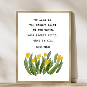 May include: A printable quote by Oscar Wilde, "To live is the rarest thing in the world. Most people exist, that is all." The quote is printed in black text on a white background with a watercolour illustration of yellow flowers and green leaves at the bottom.